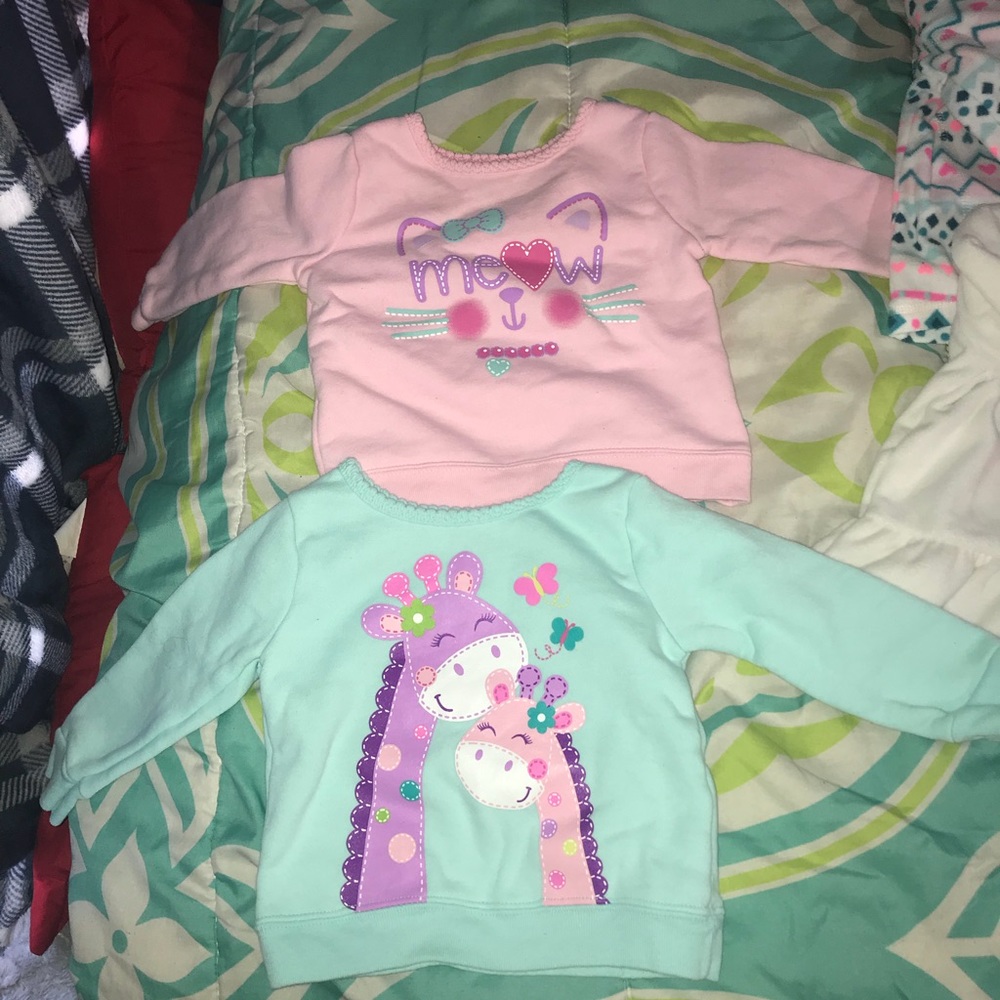 Four 6-9 months infant sweaters